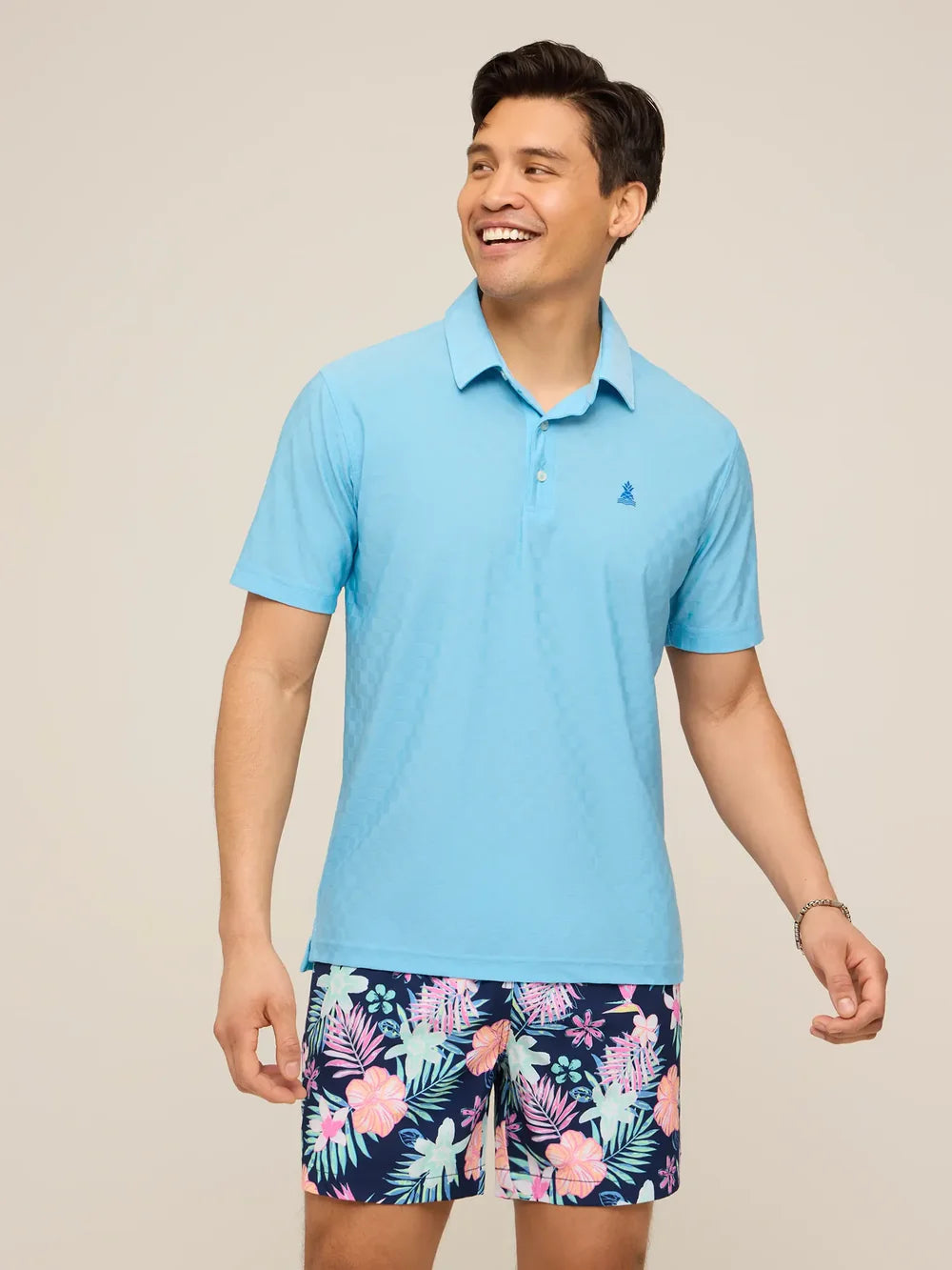 The Afternoon Blue Textured Performance Polo | Chubbies